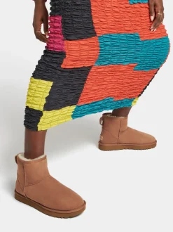 UGG – Lammfell-Boots aus Veloursleder kastanienbraun