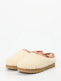 UGG – Lammfell-Clogs aus Fell in Cremeweiß