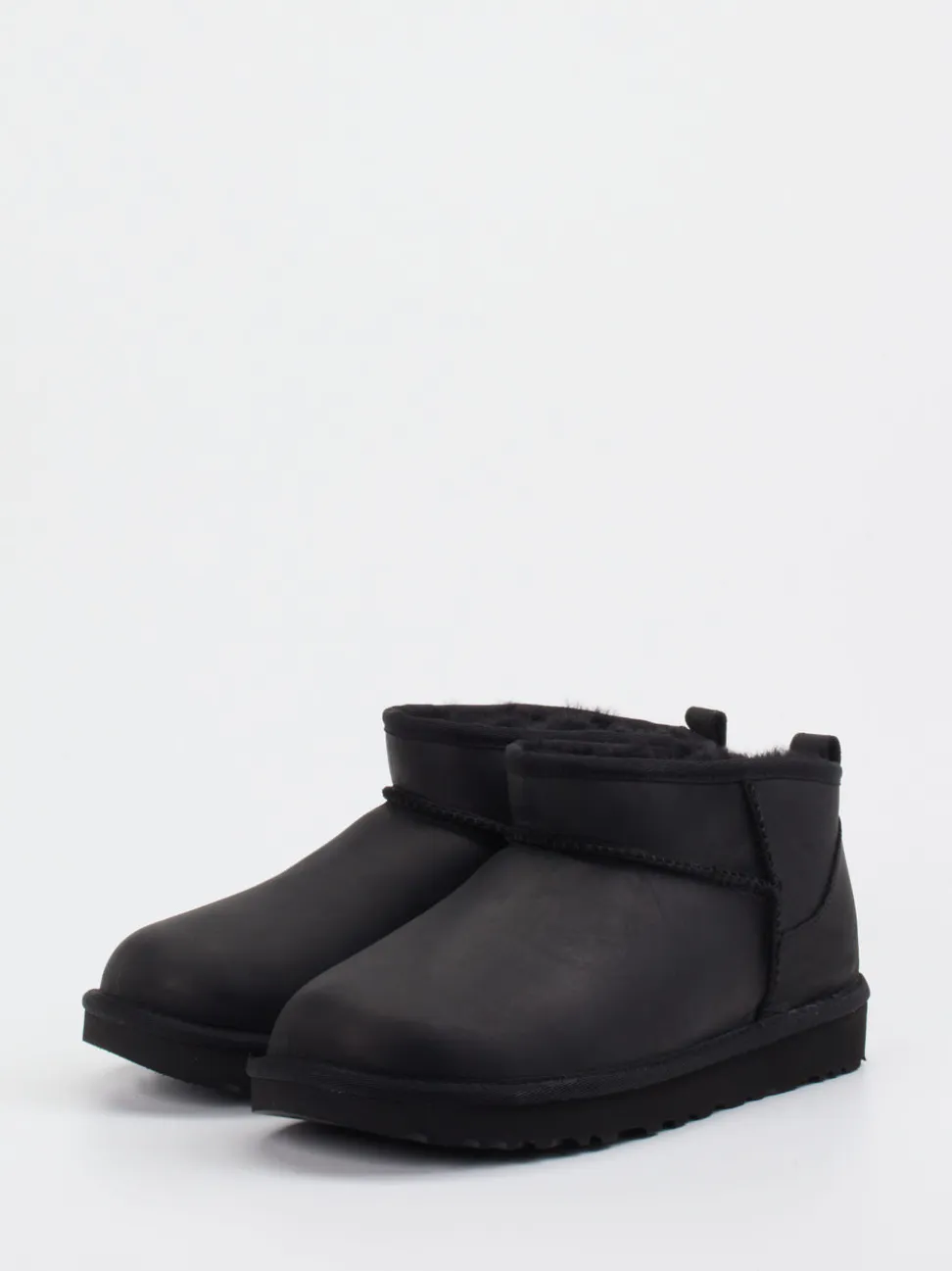 UGG – Lammfell-Stiefelette aus Veloursleder Schwarz