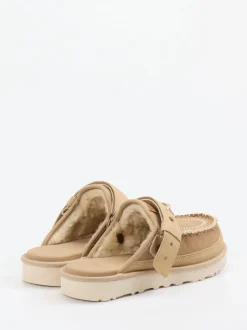 UGG – Mules aus Veloursleder mit Lammfellfutter